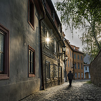 Buy canvas prints of A man walking in Mala Strana  district in Prague,  by Sergio Delle Vedove