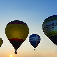 Buy canvas prints of Balloons flying at the sunset by Sergio Delle Vedove