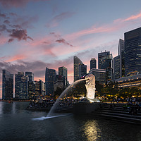 Buy canvas prints of Merlion fountain at sunset in Singapore by Sergio Delle Vedove