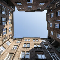Buy canvas prints of Upward view among the buildings in Warsaw by Sergio Delle Vedove