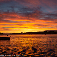 Buy canvas prints of Fiery sunrise over the Camel Estuary by Kate Whiston