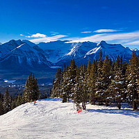 Buy canvas prints of Skiing In Lake Louise by Ross Malin