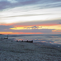 Buy canvas prints of Sunset at Wells Next the Sea by Kim Wright