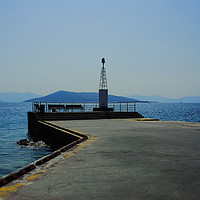 Buy canvas prints of Lighthouse on Aegina Pier by Cassi Moghan