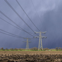 Buy canvas prints of Power pylon in bad weather by John Stuij