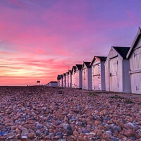 Buy canvas prints of Sunset at the beach huts by Carolyn Brown-Felpts