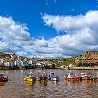 Buy canvas prints of Fishing Boats in Staithes harbour,North Yorkshire by Alan Deeley