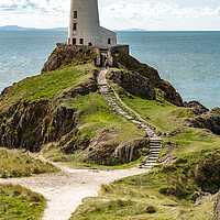 Buy canvas prints of Llanddwyn lighthouse  by Alan Deeley