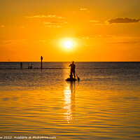 Buy canvas prints of Paddleboarder at sunset by Robin Lee
