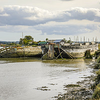 Buy canvas prints of Boat wrecks at Oare Creek by Robin Lee