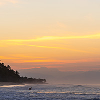 Buy canvas prints of Surfer at sunrise by Chris Rabe