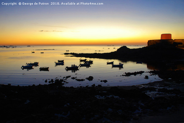 Sunset over Rocquaine Bay, Guernsey. Picture Board by George de Putron