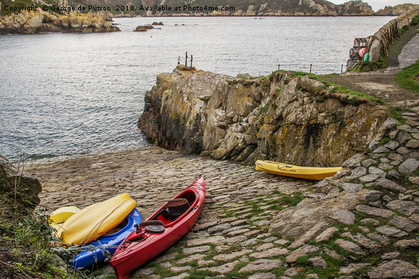 Kayaks at Saints Bay Harbour, Guernsey. Picture Board by George de Putron