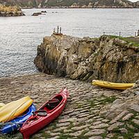 Buy canvas prints of Kayaks at Saints Bay Harbour, Guernsey. by George de Putron