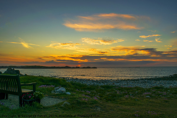 Sunset over Pembroke bay, Guernsey. Picture Board by George de Putron