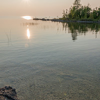 Buy canvas prints of Beautiful calm sunset on the clear Lake Huron  by Claire Smith