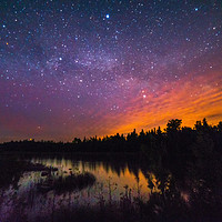 Buy canvas prints of Colorful moonrise and stars over Willow Creek by Claire Smith
