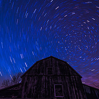 Buy canvas prints of Brilliant star trails over old Ontario Barn by Claire Smith