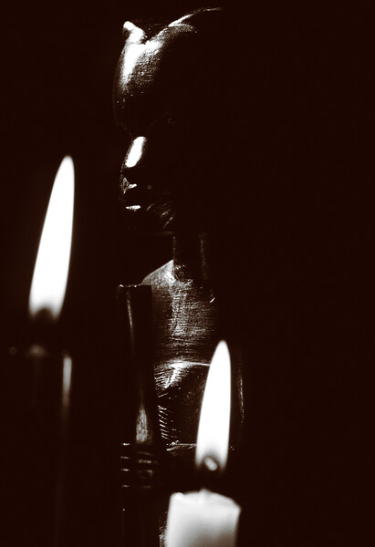 closeup of an african statue in sepia Picture Board by youri Mahieu