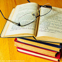 Buy canvas prints of Stack of Antique Books and Spectacles 1 by Mike Dale