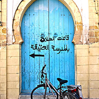Buy canvas prints of Door and Bicycle, Morocco by Roz Collins