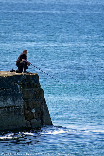 Outdoor man fishing off pier Picture Board by Tom McPherson