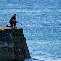 Buy canvas prints of Outdoor man fishing off pier by Tom McPherson