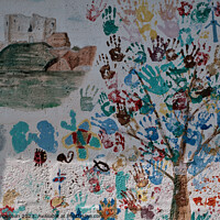 Buy canvas prints of Children's Mural on Duffus Village Wall by Tom McPherson