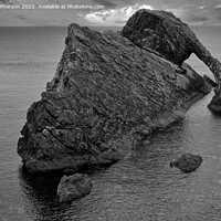 Buy canvas prints of The Arch of Bow Fiddle Rock by Tom McPherson