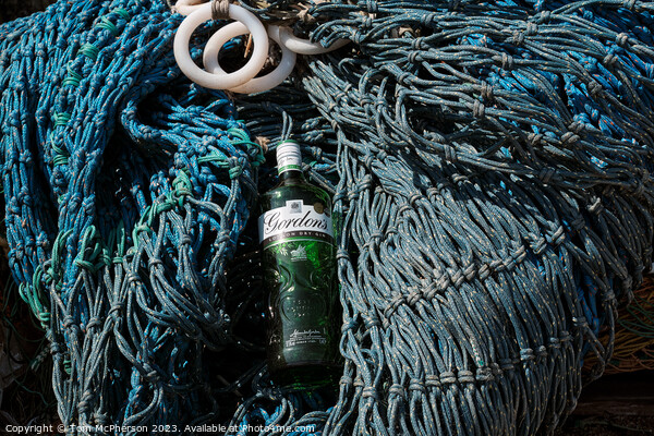Abstract Gin bottle on fishing nets Picture Board by Tom McPherson