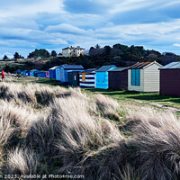 Buy canvas prints of Vibrant Rows of Hopeman Beach Huts by Tom McPherson