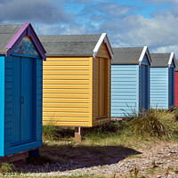 Buy canvas prints of Captivating Findhorn Beach Huts by Tom McPherson