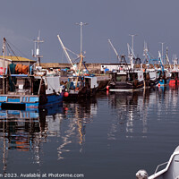 Buy canvas prints of "Harbour Haven: A Serene View of Burghead" by Tom McPherson