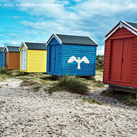 Buy canvas prints of Hidden Coastal Jewel: Findhorn Beach Huts by Tom McPherson