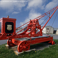 Buy canvas prints of A Timeless Relic: Hopeman Harbour's Restored Crane by Tom McPherson