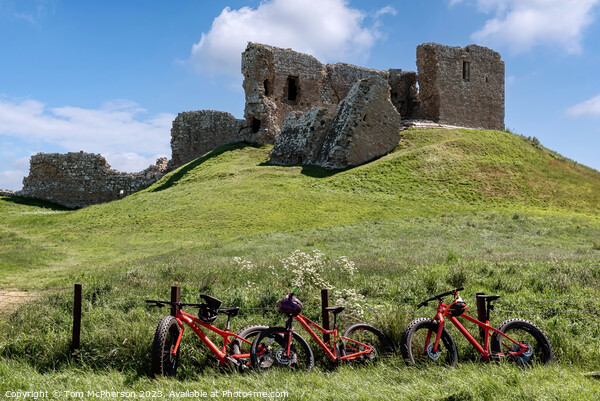 Three Bikes at Duffus Castle Picture Board by Tom McPherson
