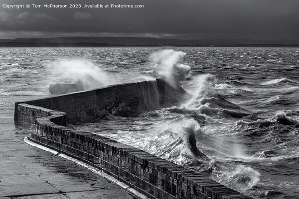 Huge waves break over Burghead pier during sea storm on the Moray Firth. Picture Board by Tom McPherson