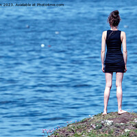 Buy canvas prints of Girl on a Rock by Tom McPherson