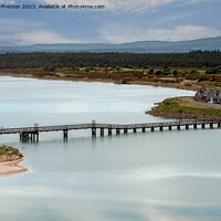 Buy canvas prints of Lossiemouth's Iconic Wooden Bridge by Tom McPherson