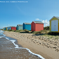 Buy canvas prints of Multi-Coloured Huts on Findhorn Beach by Tom McPherson