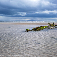 Buy canvas prints of Wreck on Burghead Beach by Tom McPherson