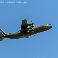 Buy canvas prints of The C-130J Hercules farewell flypast by Tom McPherson