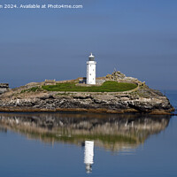 Buy canvas prints of Reflections of Godrevy Lighthouse by Tom McPherson