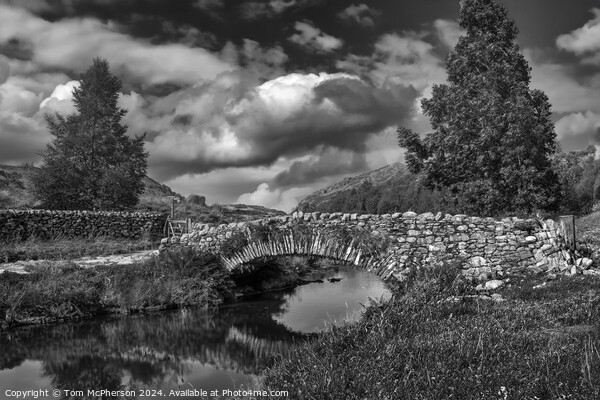 The stone bridge of Watendlath Picture Board by Tom McPherson