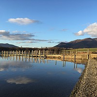 Buy canvas prints of Derwentwater and the Skiddaw Massif. by Phil Wilson