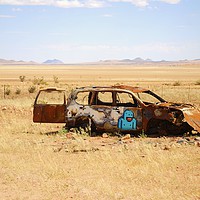 Buy canvas prints of Abandoned car somewhere in Namibia by Damien Zasikowski