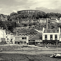 Buy canvas prints of Oban Harbor with McCaig's Tower on the skyline.  by David Jeffery