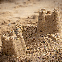 Buy canvas prints of Sandcastles on the Beach by David Jeffery
