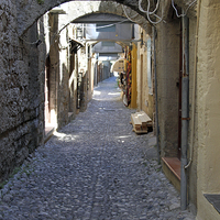 Buy canvas prints of  cobbled streets of rhodes by mark philpott