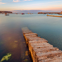 Buy canvas prints of Stone jetty in Swanage Harbour by Thomas Faull